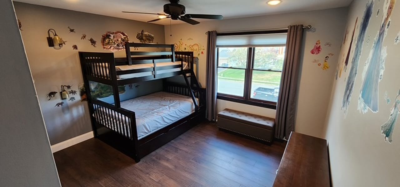 Rustic plank flooring installed in a kids&rsquo; bunk-bed room by Frankie D&rsquo;s Flooring